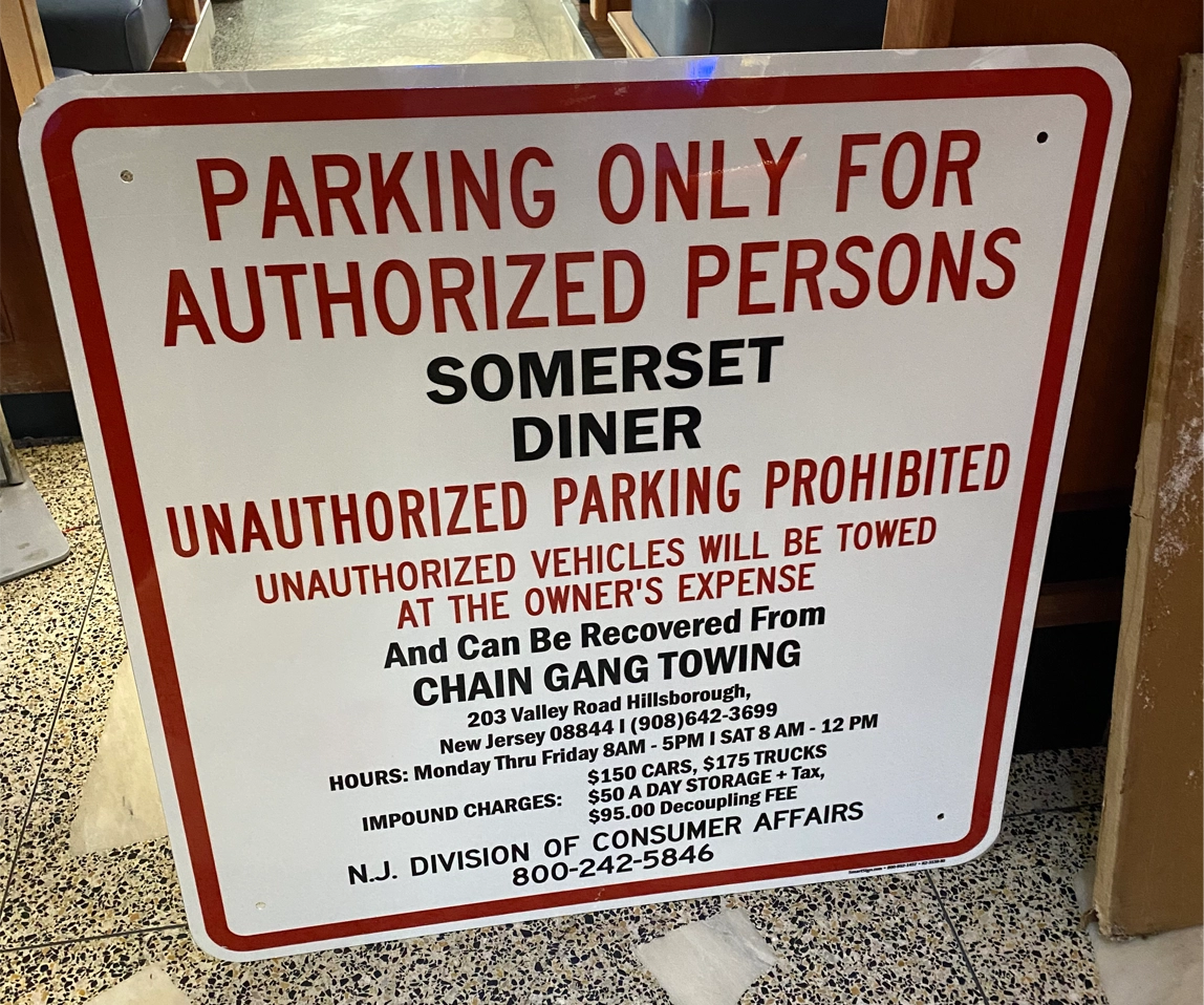 Private property sign from Chain Gang Towing and Recovery Agency 9